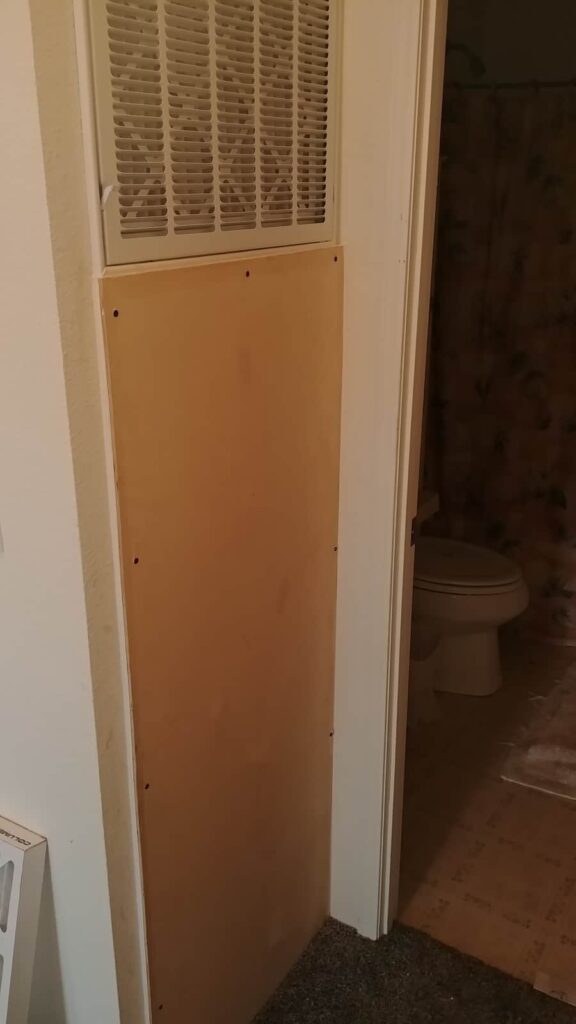 mobile home furnace with plywood cover 