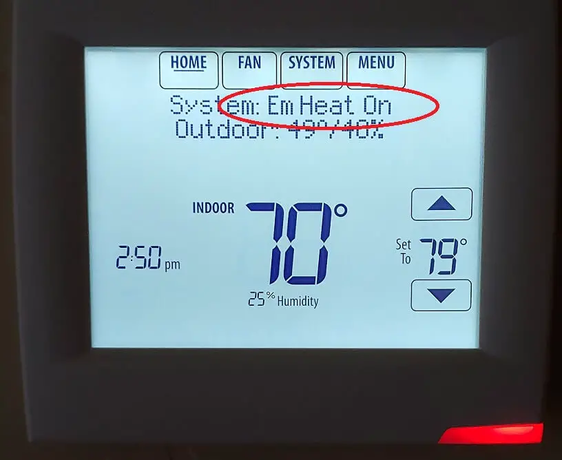 thermostat displaying emergency heat on