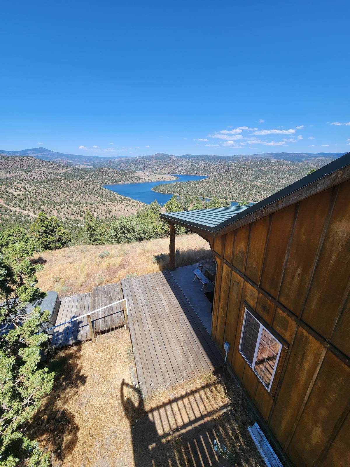 View from the cabin deck overlooking the lake in Central Oregon